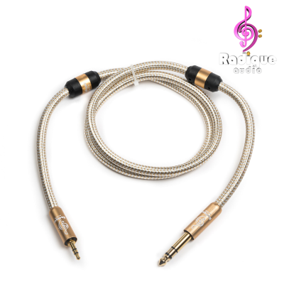 Gold Series 1/4 inch (6.35mm) to 1/8 inch (3.5mm) TRS cable – Radique Audio, shielded, gold-plated connectors, with dual degaussing rings and premium gold mesh jacket.