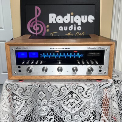 Marantz 2240 stereo receiver in WC-22 Style Ottawa Valley cherry cabinet — front view, silver faceplate and blue/red dial illumination.