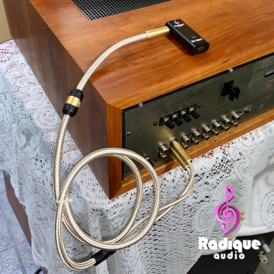 Radique Audio RA‑Twin II Bluetooth streamer connected to a vintage Luxman amplifier using Gold Series 3.5mm to Dual RCA cable — premium upgrade bundle for richer sound