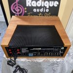 Marantz 2265 vintage stereo receiver in cherry cabinet — close-up of dial scale and meters