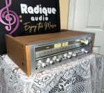 Pioneer SX-650 vintage stereo receiver in Ottawa Valley cherry cabinet — angled front showing cherry cabinetry