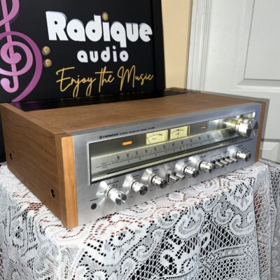 Pioneer SX-650 vintage stereo receiver in Ottawa Valley cherry cabinet — angled front showing cherry cabinetry