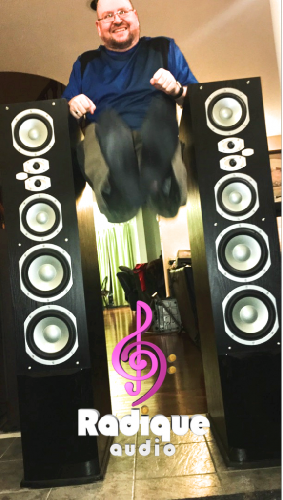 Mark at Radique Audio with oversized floorstanding speakers too large to ship by standard courier