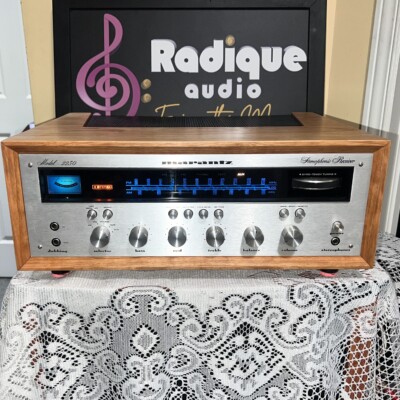 Marantz 2230 stereo receiver in custom Ottawa Valley cherry cabinet — front view, silver faceplate and blue dial illumination.