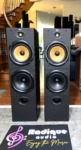 B&W DM603 three-driver floorstanding speakers, pair — front view showing the yellow Kevlar midrange and dual woofers