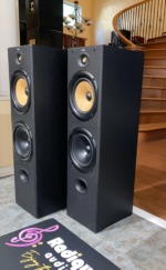 B&W DM603 floorstanding speakers, pair — angled view of the driver array and black ash cabinets