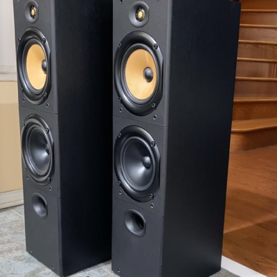 B&W DM603 floorstanding speakers, pair — angled view of the driver array and black ash cabinets