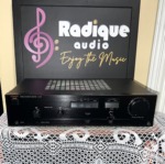 Luxman LV-90 integrated amplifier — black faceplate with input selector and large volume control