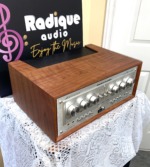 Marantz 1152DC vintage integrated amplifier in custom Ottawa Valley cherry cabinet — three-quarter view from the left, cherry side panel and top