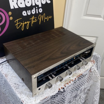 Marantz 2215B vintage stereo receiver — angled front-left view showing the top panel and front controls.