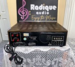 Marantz 2220 vintage stereo receiver in stock walnut veneer cabinet — rear panel with phono, tape, and speaker terminals
