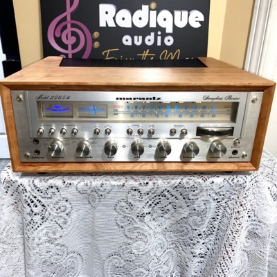 Marantz 2265B vintage stereo receiver in custom Ottawa Valley cherry cabinet — angled front view, silver faceplate with blue dial glow