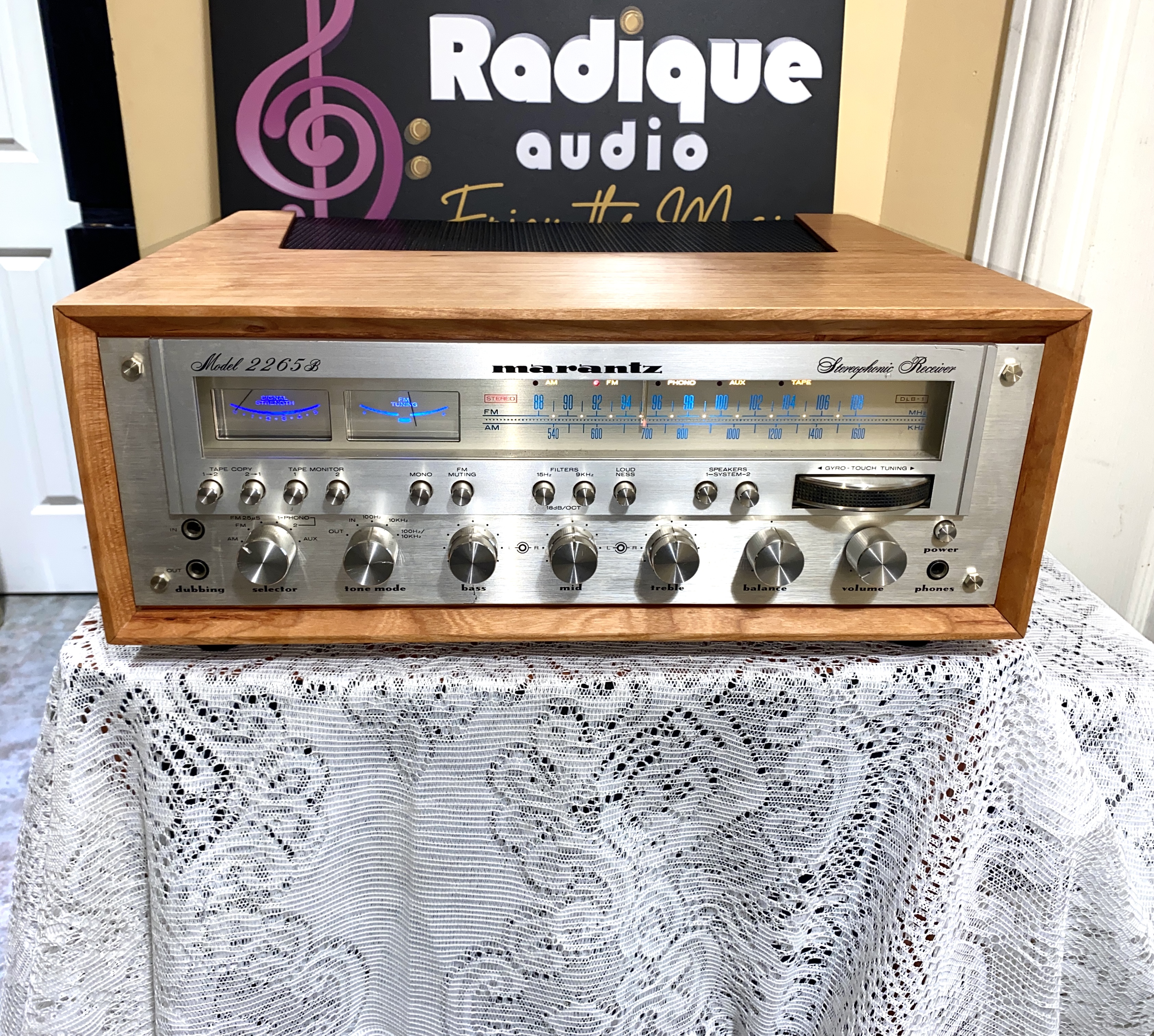 Marantz 2265B Cherry 07-25 1 Marantz 2265B vintage stereo receiver in custom Ottawa Valley cherry cabinet — angled front view, silver faceplate with blue dial glow