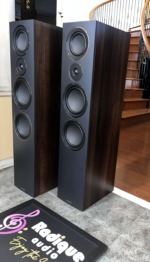 Mission LX-5 towers in walnut — angled view of the pair