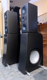 NHT Evolution T5 tower — side angle showing the exposed 12-inch side-firing subwoofer driver