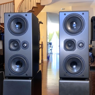 NHT Evolution T5 speakers — close view of the upper 4-way modules showing tweeter, midrange and dual drivers