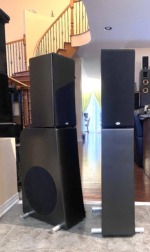 NHT Evolution T5 towers, pair — right-side angle showing the subwoofer driver and cabinet depth