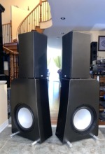 NHT Evolution T5 towers, pair — angled view showing both 12-inch side-firing subwoofer cones