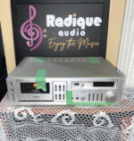 Onkyo TA-2040 cassette deck front panel in silver, with green tape marking it as a parts unit