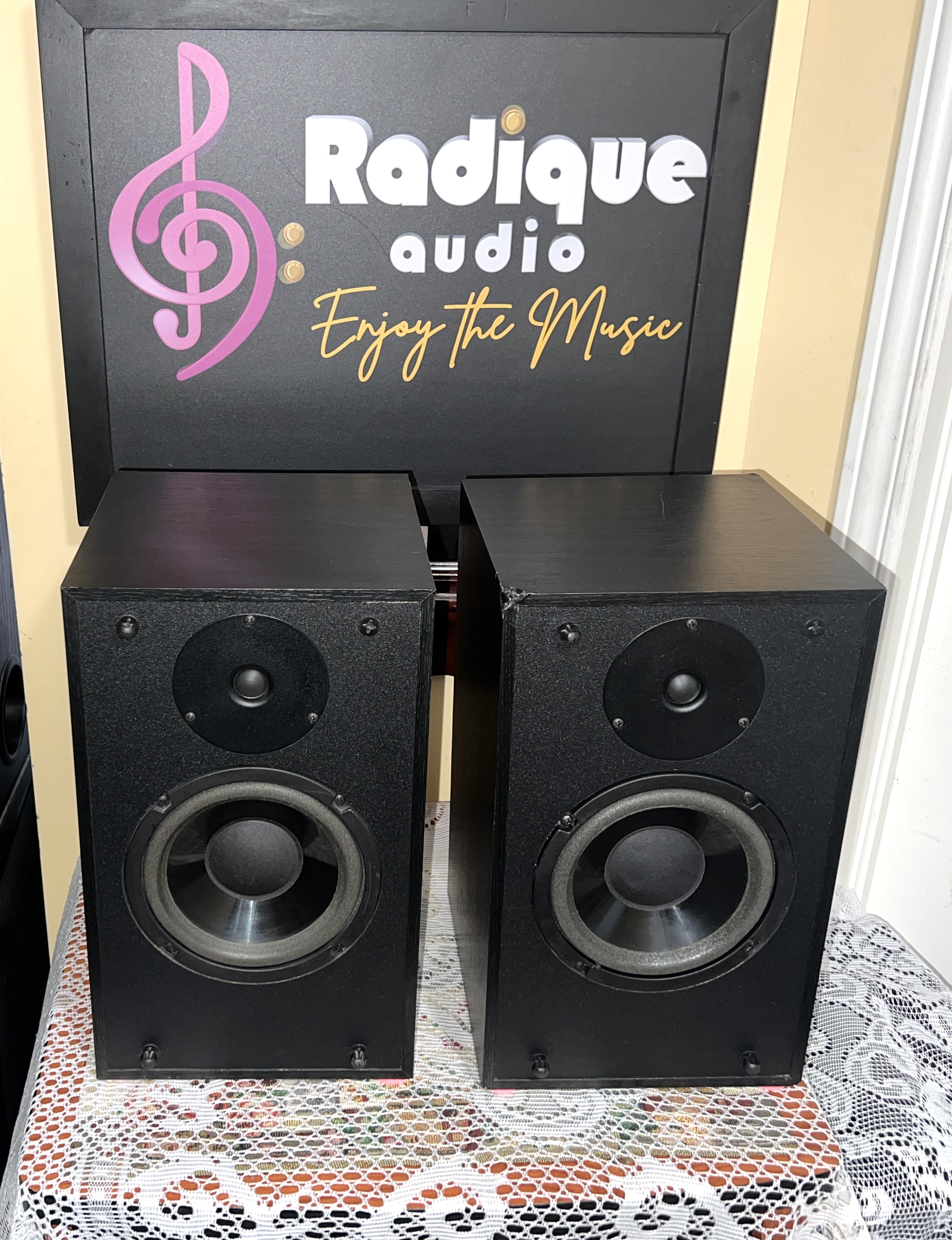 PSB Century 300i aug 2026 1 PSB Century 300i speakers with grilles off — 6.5-inch woofer and dome tweeter on each
