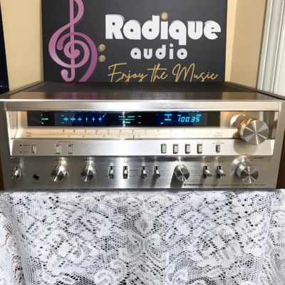 Pioneer SX-3800 vintage stereo receiver with original wood side panels — front view