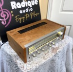 Pioneer SX-550 angled view showing cherry wood side panels and vintage 1970s styling