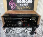 Pioneer SX-750 vintage receiver in cherry cabinet — rear panel with speaker terminals, inputs and power cord