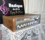 Pioneer SX-650 vintage stereo receiver in Ottawa Valley cherry cabinet — angled front showing cherry cabinetry