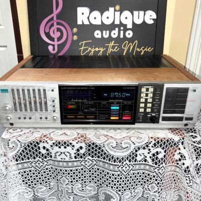 Sansui Z-9000X quartz synthesizer receiver, 130 WPC — front view with graphic equalizer sliders and digital tuning display