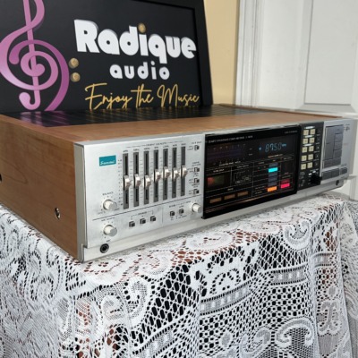 Sansui Z-9000X receiver — angled front view of the silver faceplate, EQ section and control array