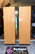 Refinished Thiel CS2.2 speakers, pair — three-quarter rear view showing the full-height refinished wood side panels