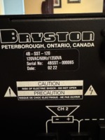 Bryston 4B SST rear identification plate — model 4B-SST-120, 120VAC/60Hz/1350VA, serial number 4BSST-000065, and the factory date stamp 02 22: the 22nd week of 2002.