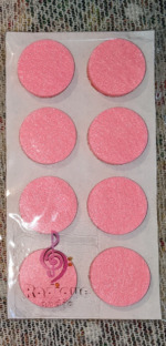 Radique Audio High Density Felt Pads, pack of 8 in Magenta on its backing card with the Radique Audio logo