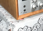 Radique Audio High Density Felt Pad in Magenta fitted under the corner of a Marantz 2230 in its cherry cabinet