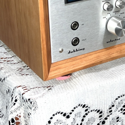 Radique Audio High Density Felt Pad in Magenta fitted under the corner of a Marantz 2230 in its cherry cabinet