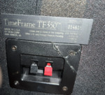 Close-up of the DCM TimeFrame TF350 model plate with serial number, made in Ann Arbor, Michigan, beside the spring terminals