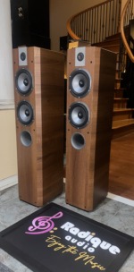 Focal Chorus 714V towers turned to show the slim Light Walnut side panels alongside the exposed drivers