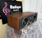 JBL Northridge EC35 centre channel from the other side, showing the cherry top and the four-driver front baffle