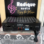 Rear panel of the JVC RX-307 with FM and AM antenna terminals, phono, CD and tape RCA jacks, two pairs of speaker terminals and a switched AC outlet