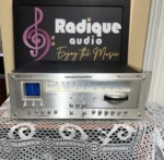 Marantz 2130 stereo tuner, brushed silver faceplate with the blue oscilloscope display, long blue-lit FM/AM dial and Gyro-Touch tuning wheel