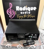 Marantz 2130 tuner from above and behind, black cover over the rear panel with the model plate, antenna terminals, RCA jacks and power cord