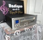 Marantz 2130 tuner from the right front corner, black metal case, silver faceplate with the Model 2130 script and quartz locked tuner badge