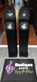 Pair of Mirage OMNI 350 tower speakers in black ash, grilles off, showing the omnipolar tweeters and woofers