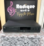 NAD 502 Compact Disc Player in charcoal grey, front view with disc tray and transport buttons