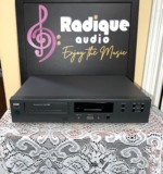 NAD 502 Compact Disc Player in charcoal grey, front view with disc tray and transport buttons