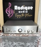 Rotel RC-1550 stereo preamplifier in silver, brushed front panel with central volume knob, bass, treble and balance controls