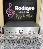 Rotel RC-1550 stereo preamplifier in silver, brushed front panel with central volume knob, bass, treble and balance controls