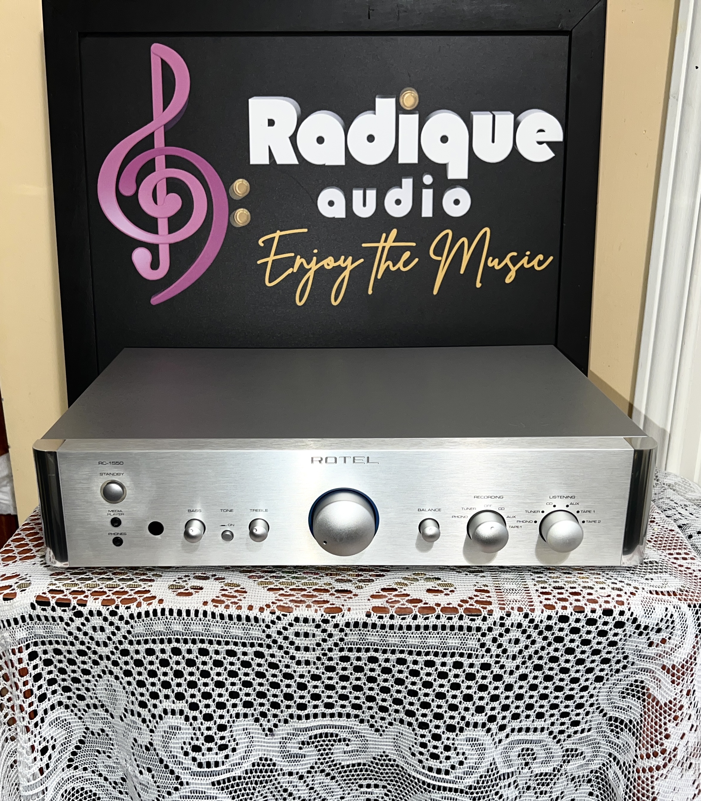 Rotel-RC-1550-Stereo-Preamplifier-Silver-Front Rotel RC-1550 stereo preamplifier in silver, brushed front panel with central volume knob, bass, treble and balance controls