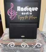 Tannoy D5C centre channel speaker in black ash with its black cloth grille and Tannoy badge fitted