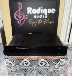 Bryston 2B stereo power amplifier, black brushed front panel with the Bryston logo and indicator lights